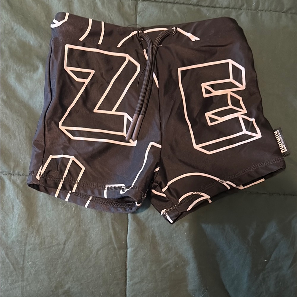 nununu Black Swim Shorts with Bold Graphics (2T - 3T)